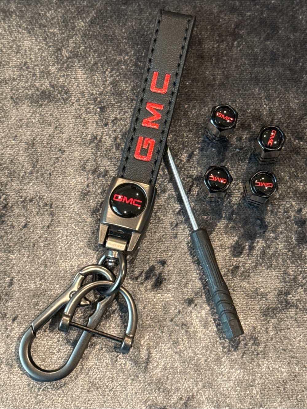 GMC Black Leather Keychain with Red Logo and Tire Valve Caps